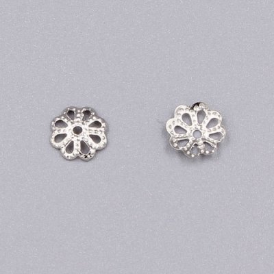 Bead cap, platinum plated iron, 7x1mm textured flower with cutouts, fits 8-12mm bead. Sold per pkg of 200.