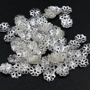 Bead cap, silver plated iron, 7x1mm textured flower with cutouts, fits 8-12mm bead. Sold per pkg of 200.
